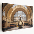 Side view of a large stretched canvas featuring a detailed illustration of Grand Central Station in muted gray and blue…