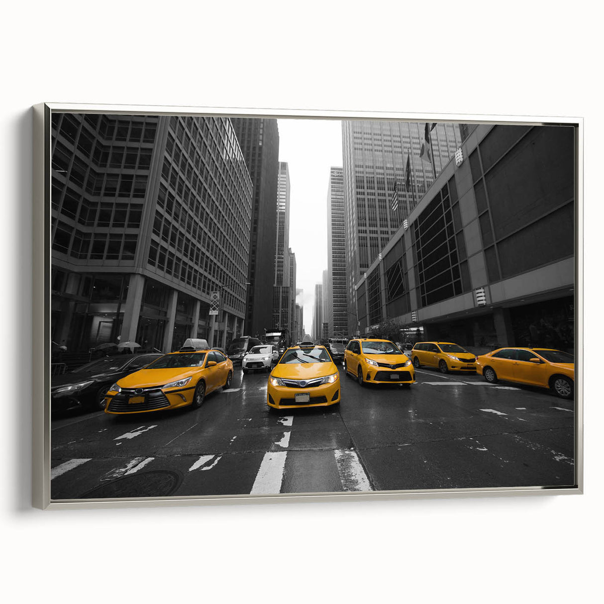 Framed canvas of a vintage-style Manhattan skyline, featuring a black and colorful palette, ideal for office decor.