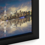 Close-up of black wall art featuring a textured depiction of the Statue of Liberty with colorful accents.