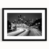 Extra large framed wall art featuring a colorful abstract depiction of the Pittsburgh skyline, ideal for living room decor.