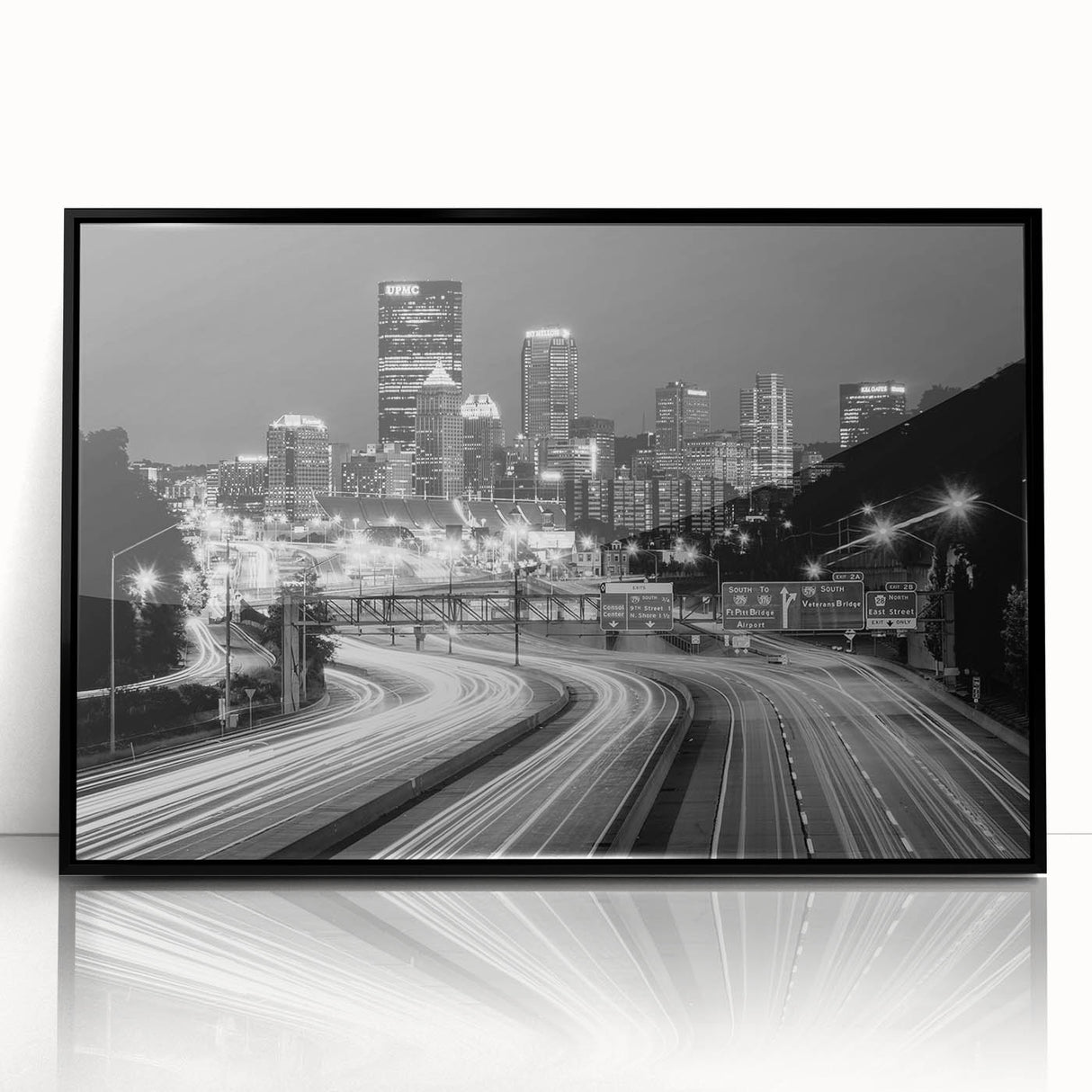 Large abstract wall art depicting the Pittsburgh skyline in black and white tones on a framed acrylic.