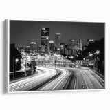 Vintage poster art of Pittsburgh skyline in vibrant colors on a large framed canvas, ideal for living room decor.