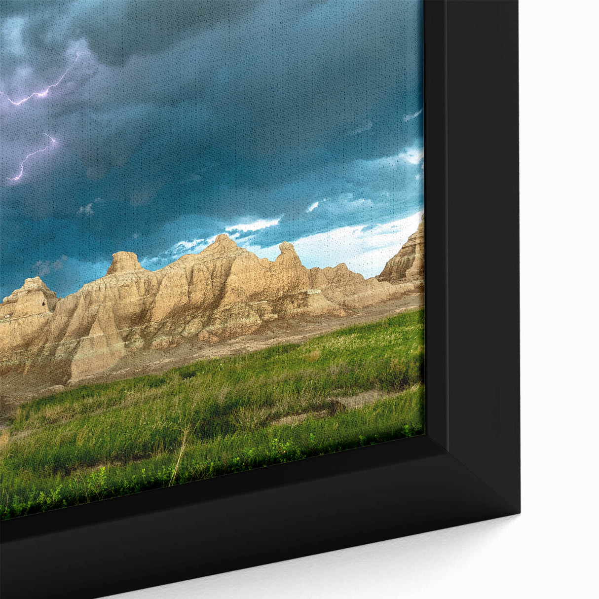 Extra large framed canvas of a textured black wall art depicting South Dakota Badlands in muted earth tones.