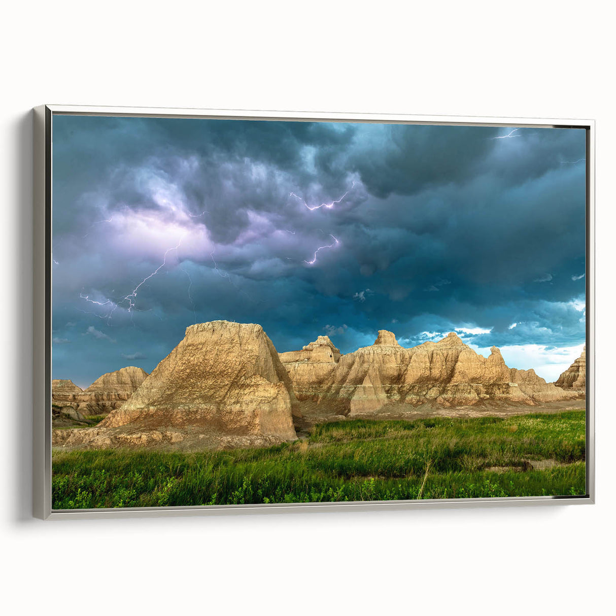 Framed canvas landscape art painting featuring the Badlands in South Dakota, rendered in colorful tones.