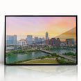 Large abstract wall art depicting the Austin, Texas skyline in muted gray and blue tones on a framed acrylic.