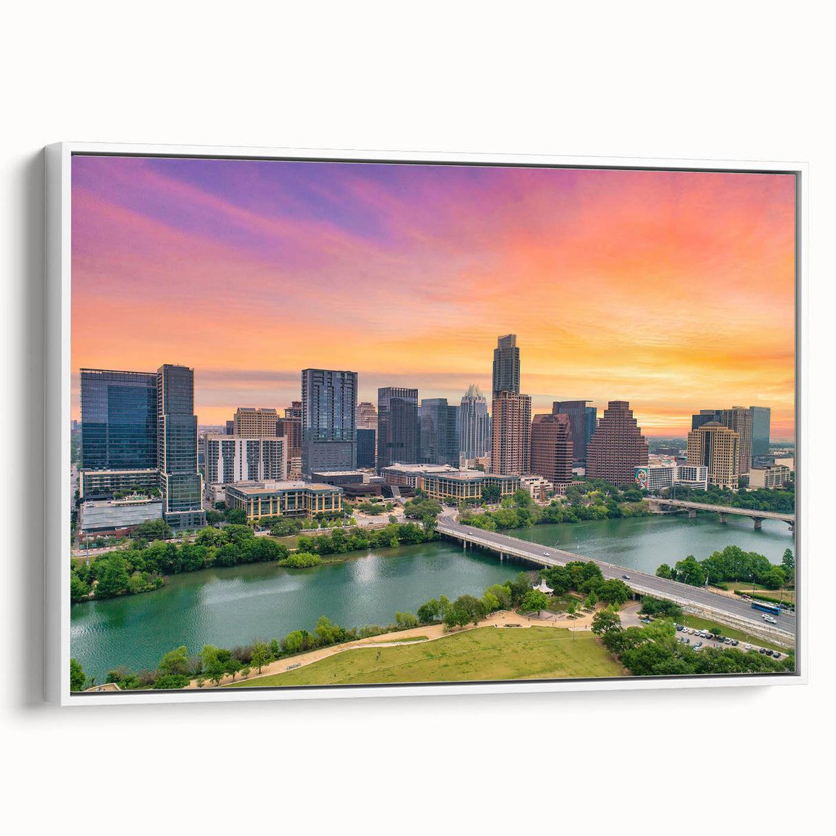 Vintage poster art of the Austin skyline, featuring colorful art on a white framed canvas, ideal for living room decor.