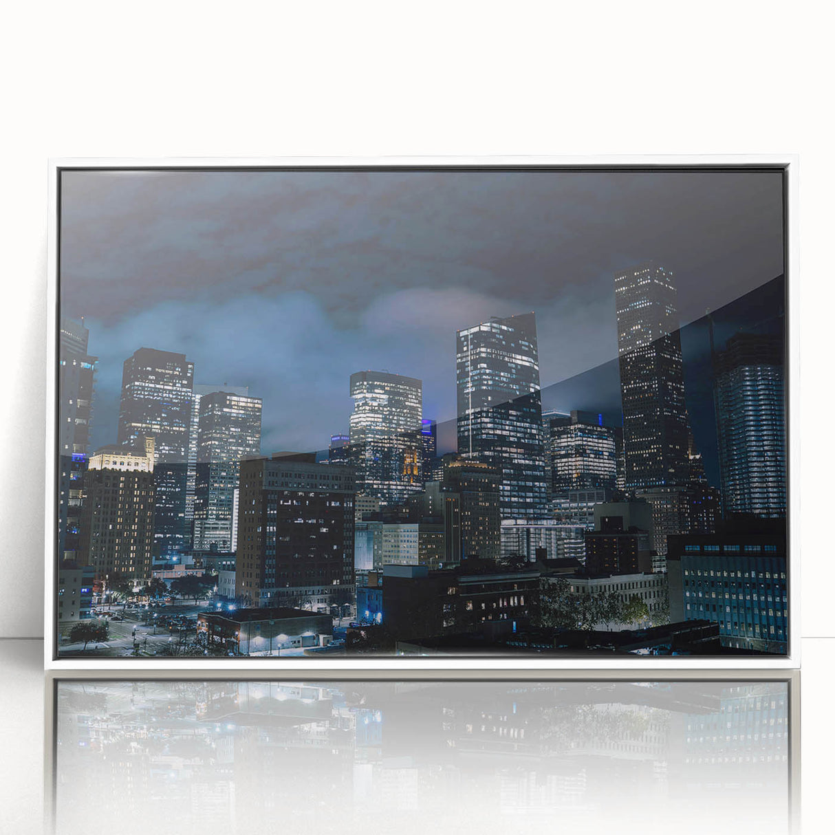 Art deco poster of Houston skyline in muted gray and blue tones on framed acrylic.