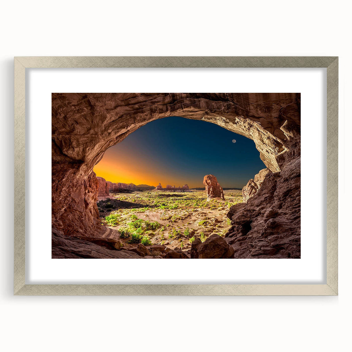 Textured art print of Arches National Park in muted earth tones on a framed canvas, suitable for bedroom decor.