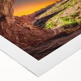 Art deco poster of Arches National Park in muted earth tones on rolled canvas, ideal for dining room decor.