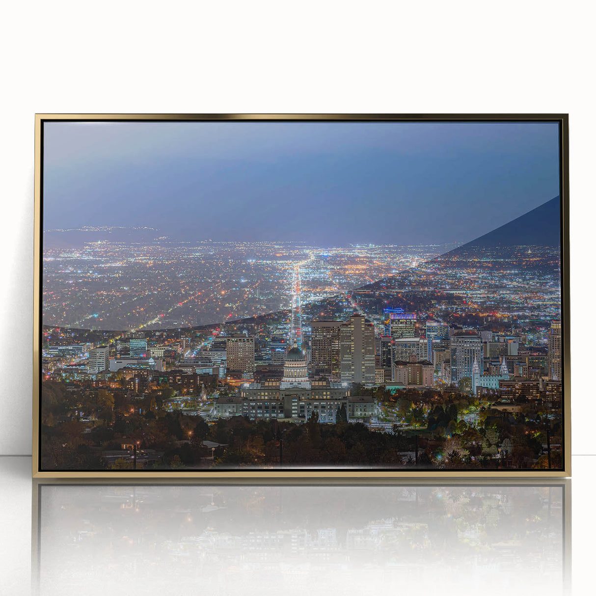 Framed acrylic print of Salt Lake City with muted gold and blue tones, in a mid-century modernist style.