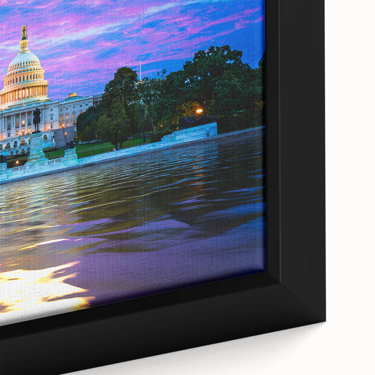 Close-up of a black framed canvas featuring a textured depiction of the Washington DC Capitol in colorful art.