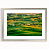 Textured art print depicting abstract Palouse scenery in muted earth tones on a framed silver mat, suited for bedroom decor.