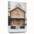 Large abstract wall art depicting a winter scene in muted blue and white tones on acrylic glass.