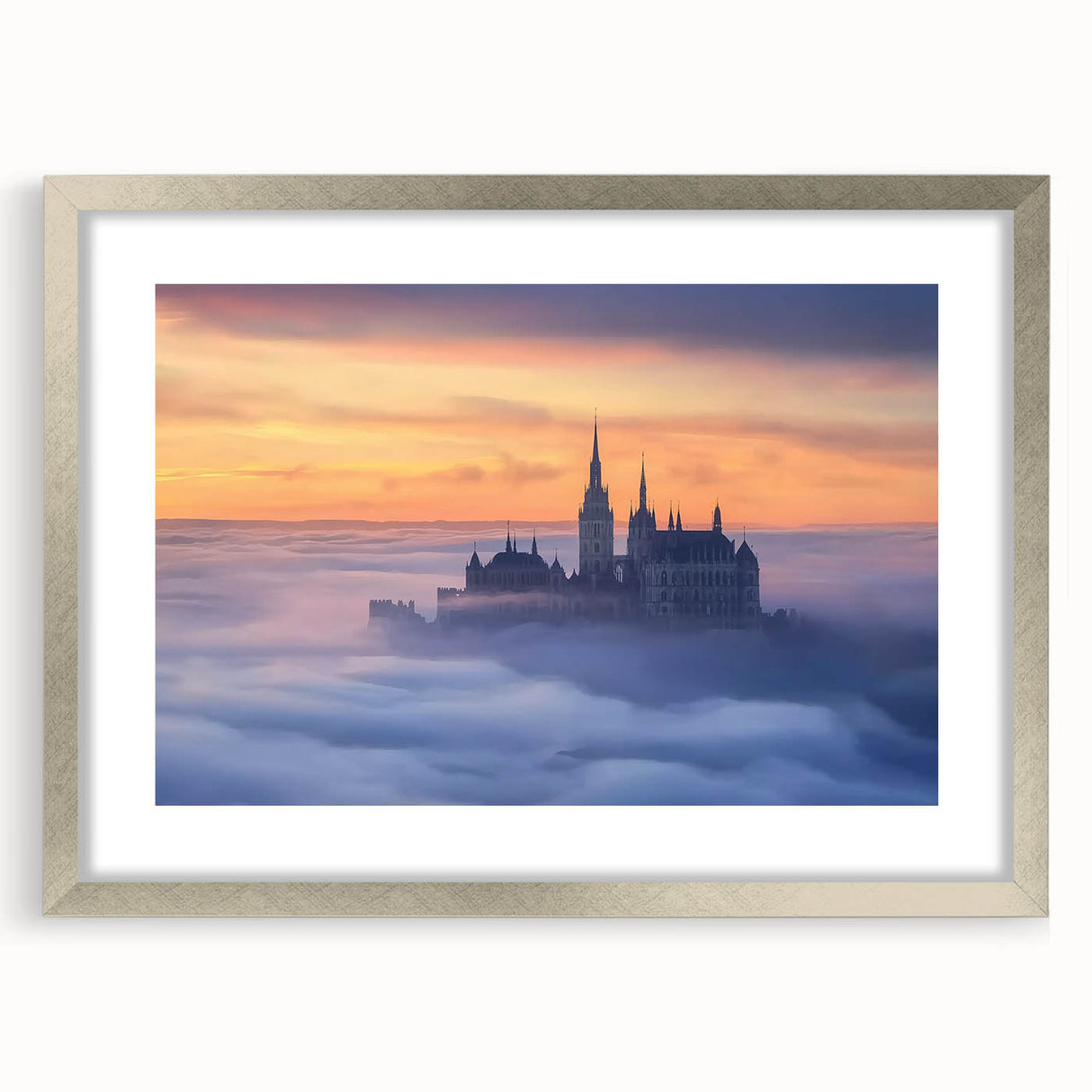 Elegant silver-framed landscape artwork featuring a picturesque castle scene, displayed with a white mat, perfect for enhancing home decor or office ambiance.