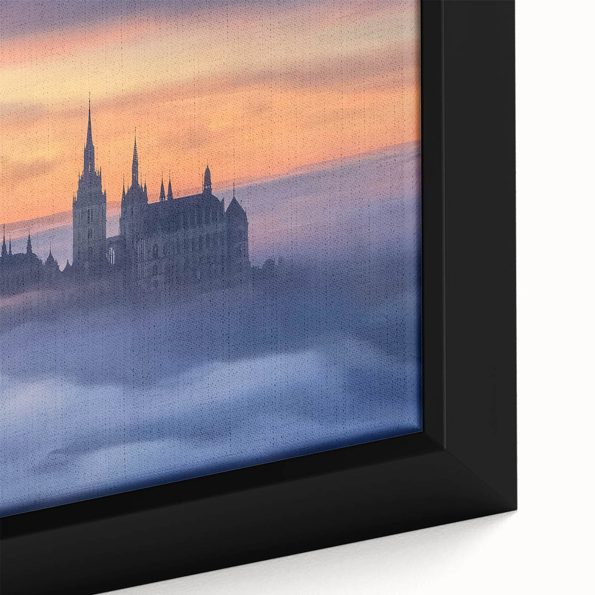 Close-up of a framed landscape canvas depicting a medieval castle surrounded by lush greenery, showcasing vibrant colors and intricate details, ideal for home decor.