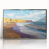 Framed acrylic artwork showcasing a stunning landscape of rugged cliffs against a vibrant sky, designed to enhance modern interiors with its silver frame.