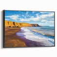 Framed canvas artwork showcasing a dramatic landscape of cliffs in rich earthy tones, displayed from the side, perfect for enhancing modern home decor.