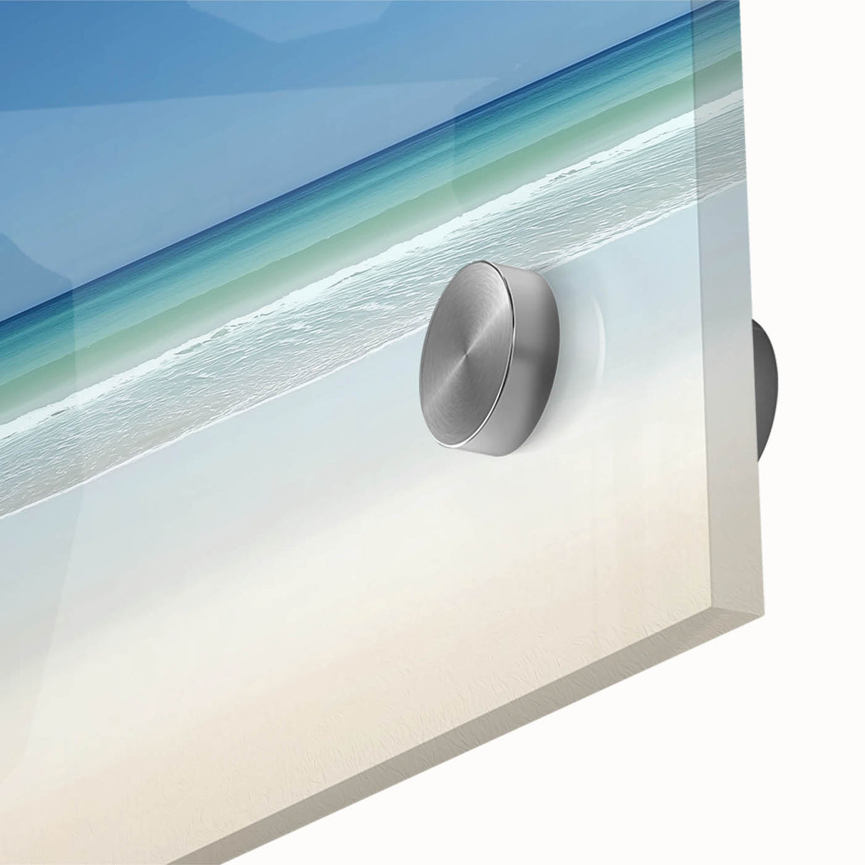 Close-up of a vibrant acrylic glass artwork depicting a serene beach landscape, showcasing soft waves, golden sands, and a clear blue sky, perfect for coastal decor.
