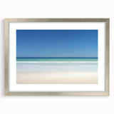 Landscape frame showcasing a picturesque beach scene with a silver mat, perfect for elevating home decor. Ideal for coastal-themed interiors or art collectors.