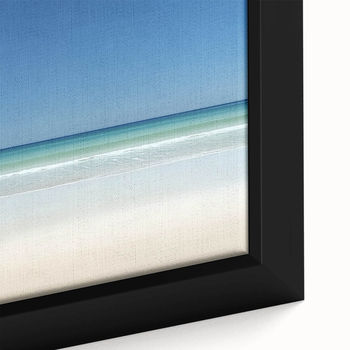 Close-up of a framed canvas artwork showcasing a vibrant beach landscape, featuring vivid colors of blue skies and sandy shores, ideal for home decor. This piece adds a serene coastal vibe to any living space.