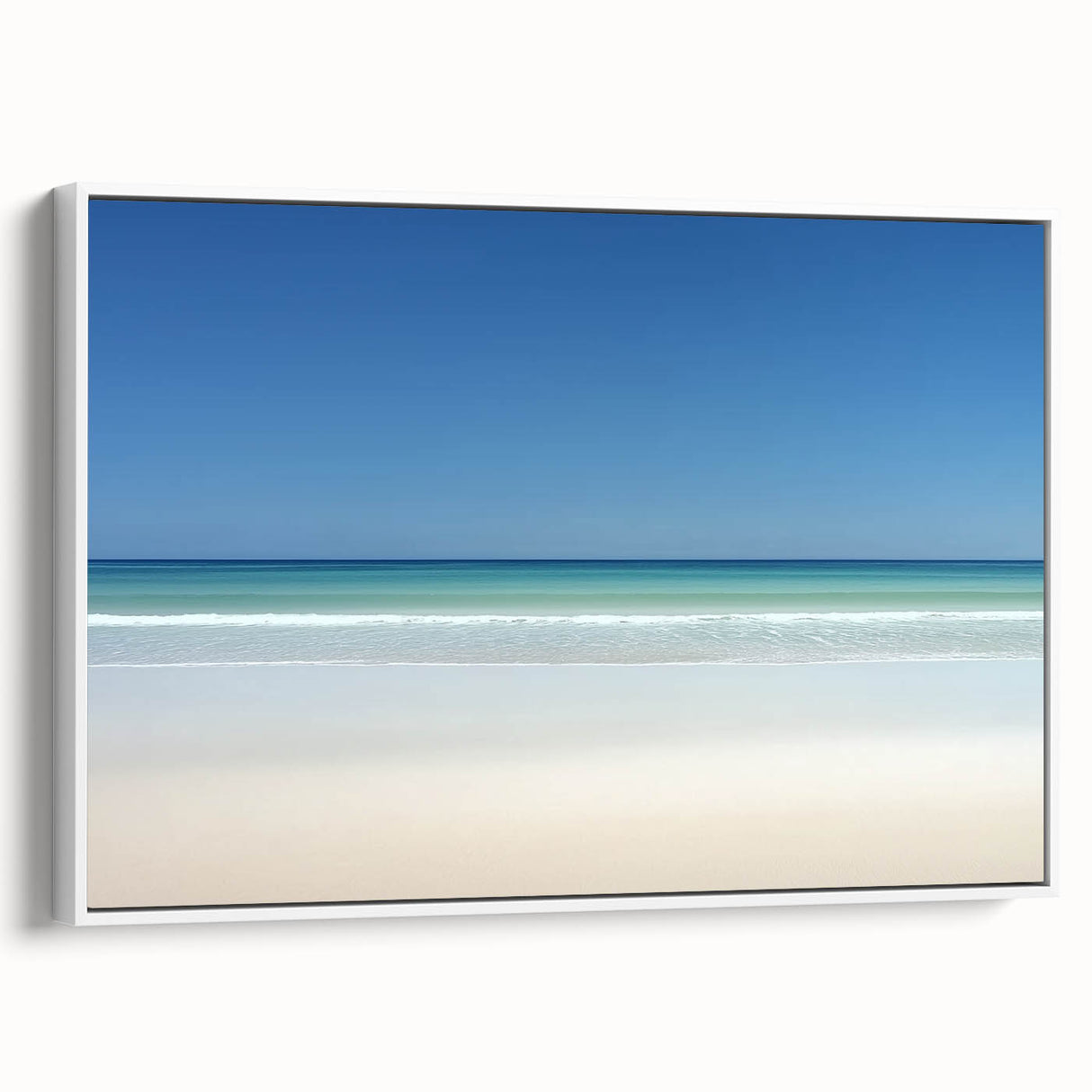 Framed landscape canvas art depicting serene beach scenery, showcasing soft pastel colors and gentle waves, with a sleek white frame enhancing its coastal aesthetic. Perfect for home decor or beach-themed interiors.