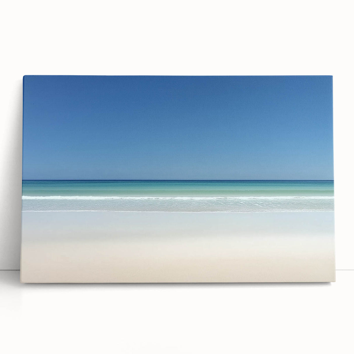 Stretched canvas artwork depicting a serene beach landscape with vibrant blues and soft whites, ideal for coastal decor in living spaces. Perfect for enhancing a tranquil atmosphere.