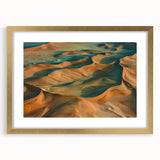 Desert landscape framed art in a gold mat, showcasing warm earth tones and intricate details, perfect for enhancing home decor in a contemporary style.
