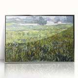 Large art print of Van Gogh's Starry Night in a silver frame, featuring swirling blue and yellow tones.