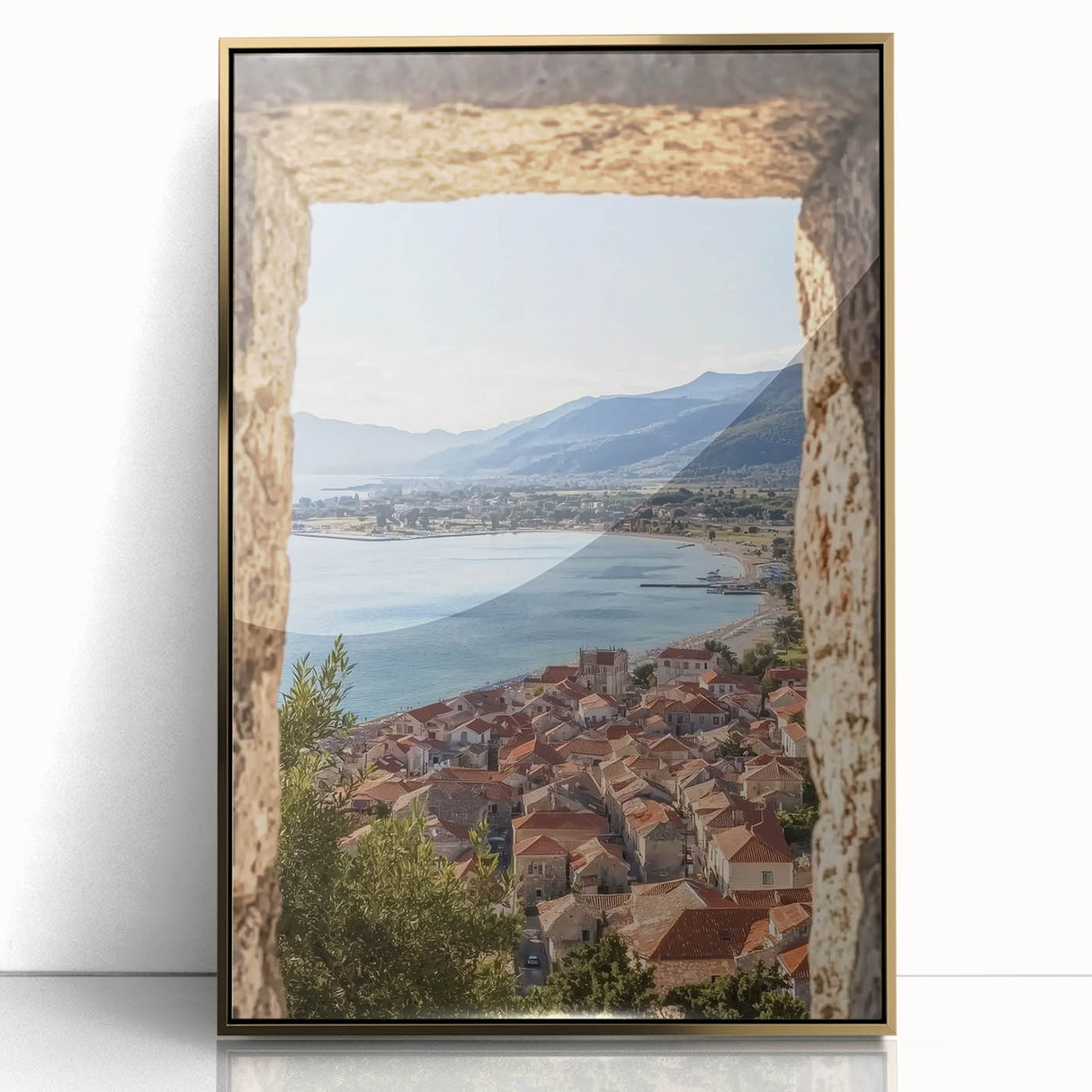 Framed acrylic artwork showcasing a stunning landscape with a medieval castle, highlighted by a gold frame, ideal for home decor enthusiasts seeking elegance and charm.