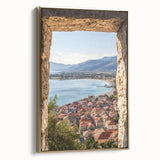 Framed canvas artwork showcasing a stunning landscape with a castle, featuring ornate gold detailing on the frame, perfect for home decor and enhancing interior aesthetics.