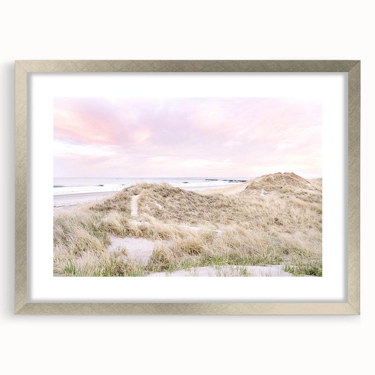 Textured abstract art print in shades of blue and gray, framed in silver, ideal for modern bedroom ambiance.