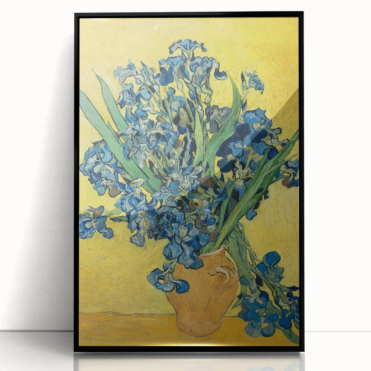 Large abstract wall art featuring swirling blue and yellow patterns, presented in a black frame.