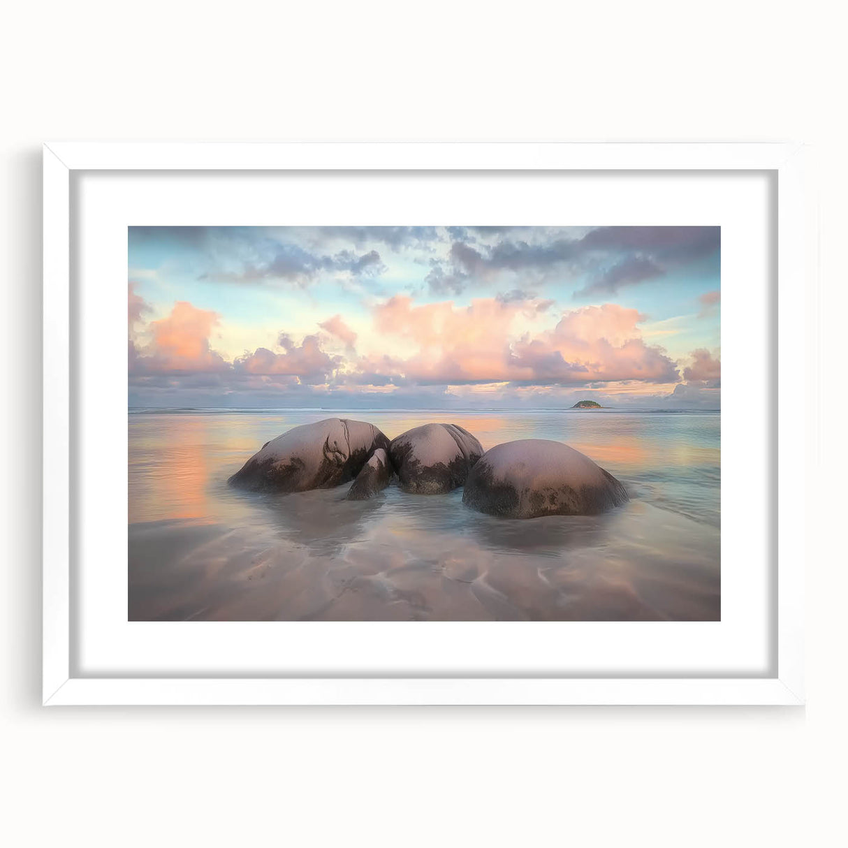 Framed landscape artwork depicting serene beaches, featuring a white mat and modern design, perfect for home decor in coastal-themed interiors.