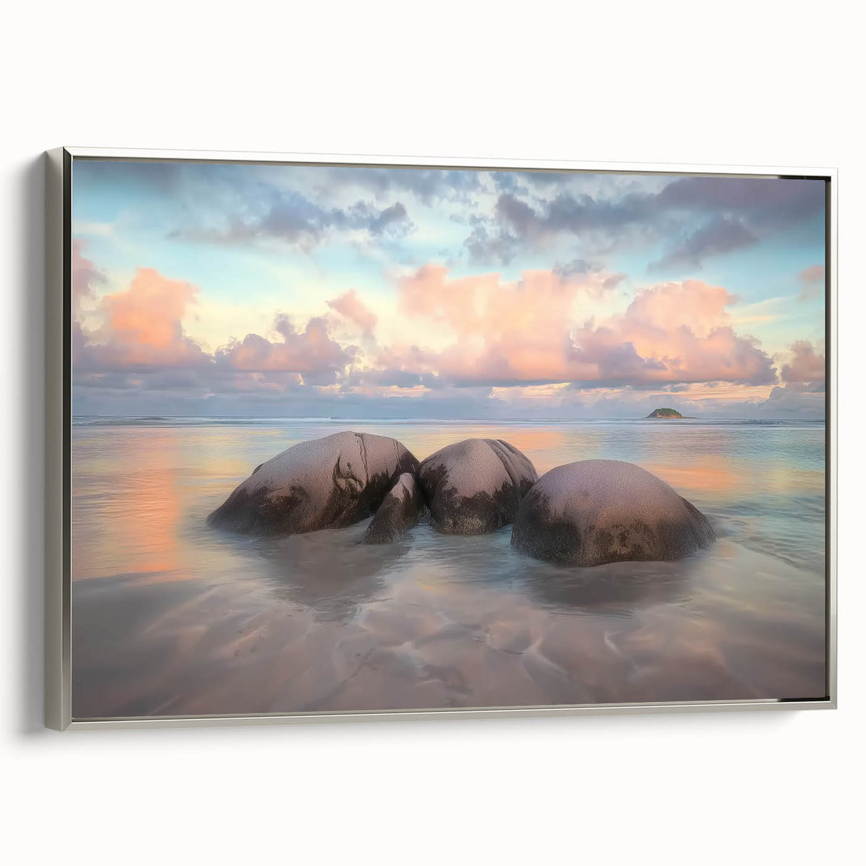 Framed landscape canvas artwork showcasing a serene beach scene with vibrant colors, featuring a sleek silver frame and perfect for home decor enhancement.