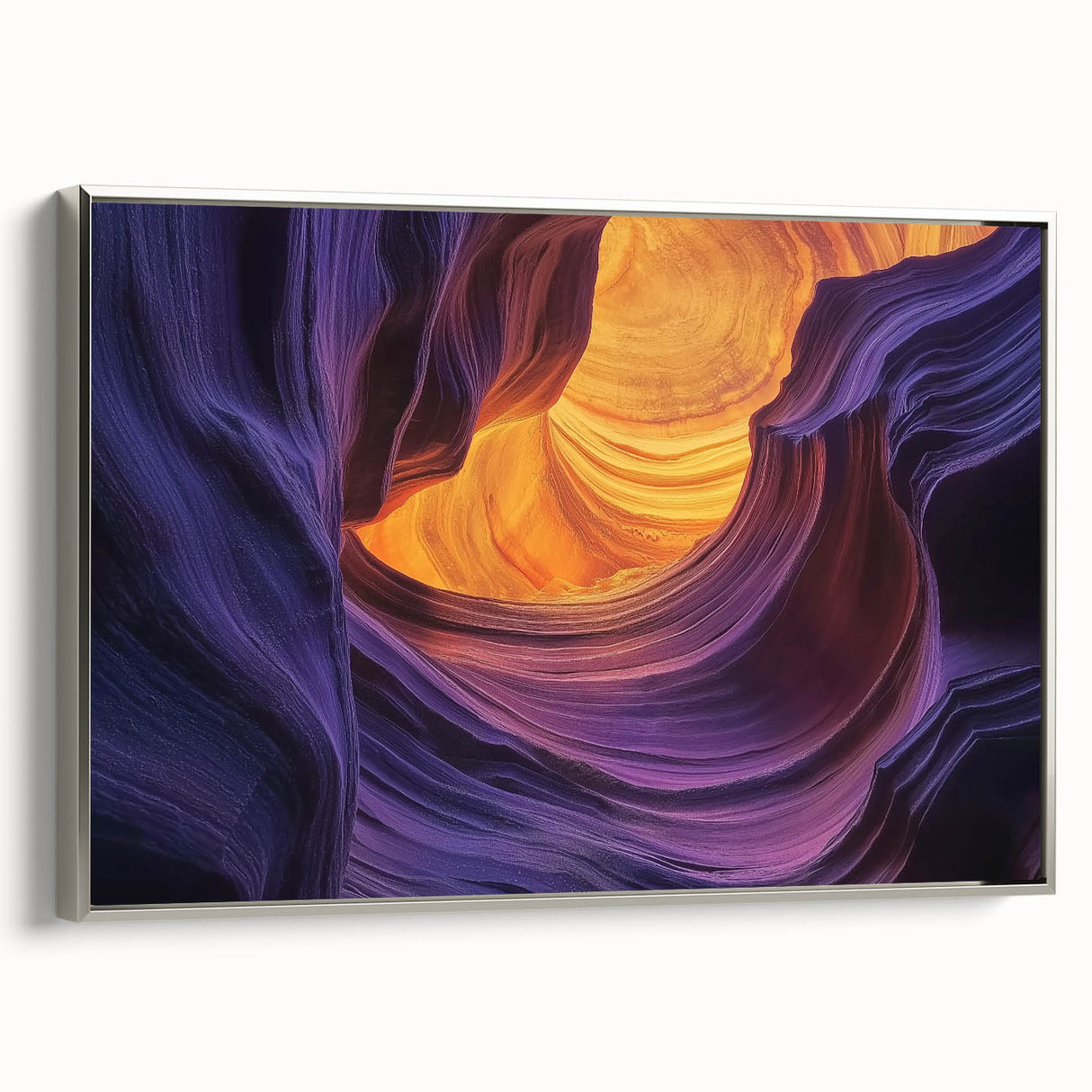 Framed canvas artwork showcasing a stunning landscape of canyons, highlighted by vibrant colors and intricate details, presented with a sleek silver frame for modern decor.