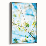 Landscape art painting of spring scene on framed canvas, featuring vibrant greens and soft pastels.