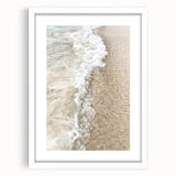 Abstract art print featuring swirling blue and white patterns on a framed white canvas.