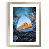 Framed landscape artwork depicting a serene cave scene with a silver mat, perfect for home decor. Ideal for nature lovers seeking elegant wall accents.