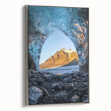 Framed canvas artwork showcasing a serene landscape with caves, featuring a silver frame that enhances the visual appeal. Ideal for modern home decor.