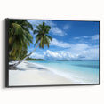 Framed canvas artwork depicting a serene beach landscape with vibrant colors, featuring a black frame and side view showcasing its elegant design. Ideal for coastal-themed decor.