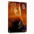 Acrylic landscape artwork of cave formations displayed in a side view, showcasing intricate textures and vibrant colors, secured with pins for stability.