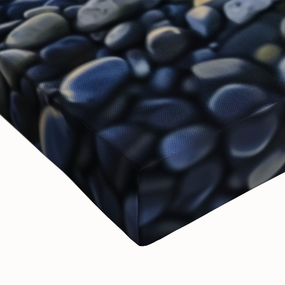 Close-up of a stretched canvas artwork depicting a vibrant beach landscape, showcasing vivid blues and sandy tones, perfect for coastal decor enthusiasts.