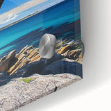 Close-up of a vibrant acrylic artwork depicting dramatic cliffs and landscapes, showcasing intricate textures and vivid colors, perfect for modern home decor.
