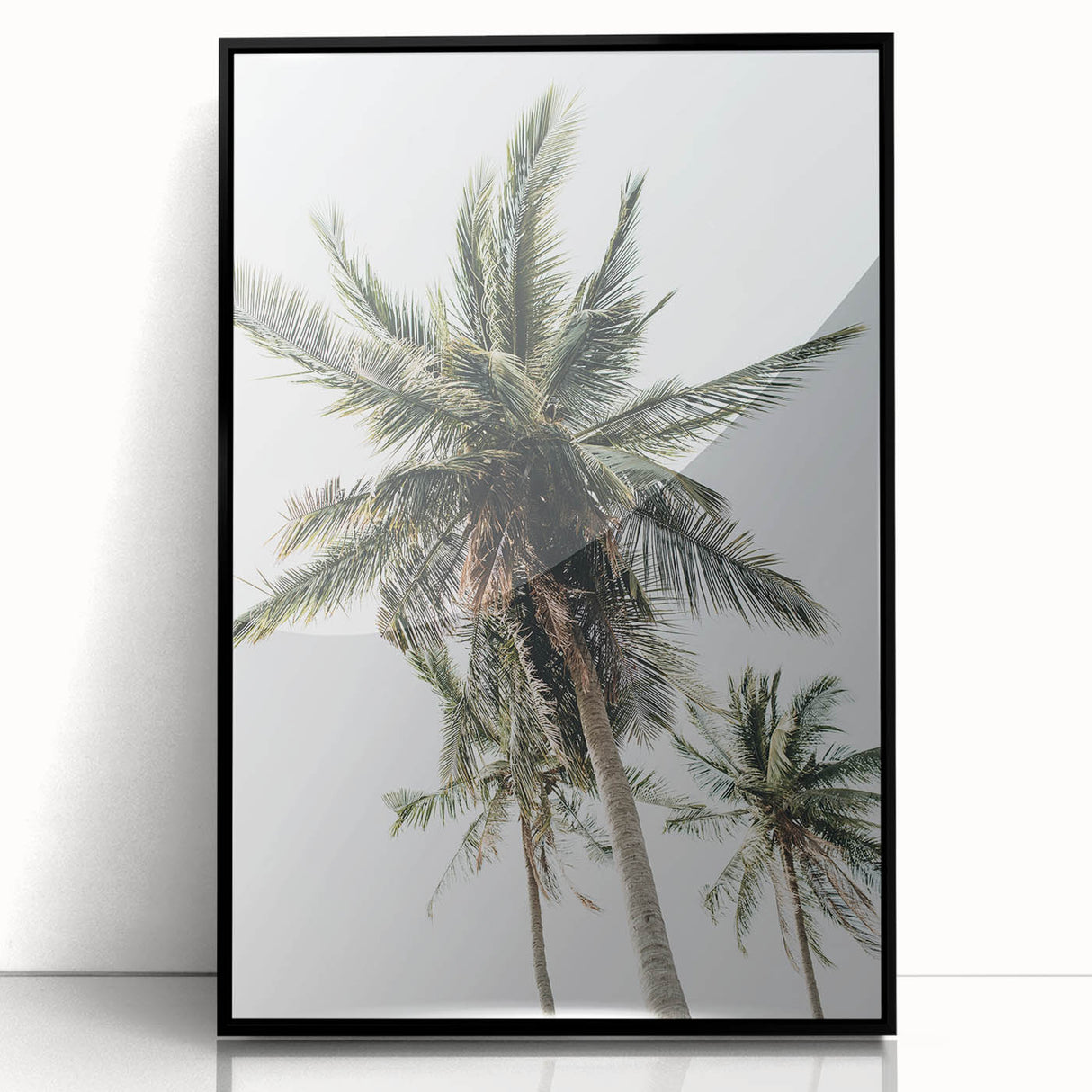 Large abstract wall art featuring swirling black and white patterns on acrylic, framed in black.