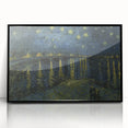 Large abstract wall art print featuring swirling blue and yellow patterns on a framed acrylic.