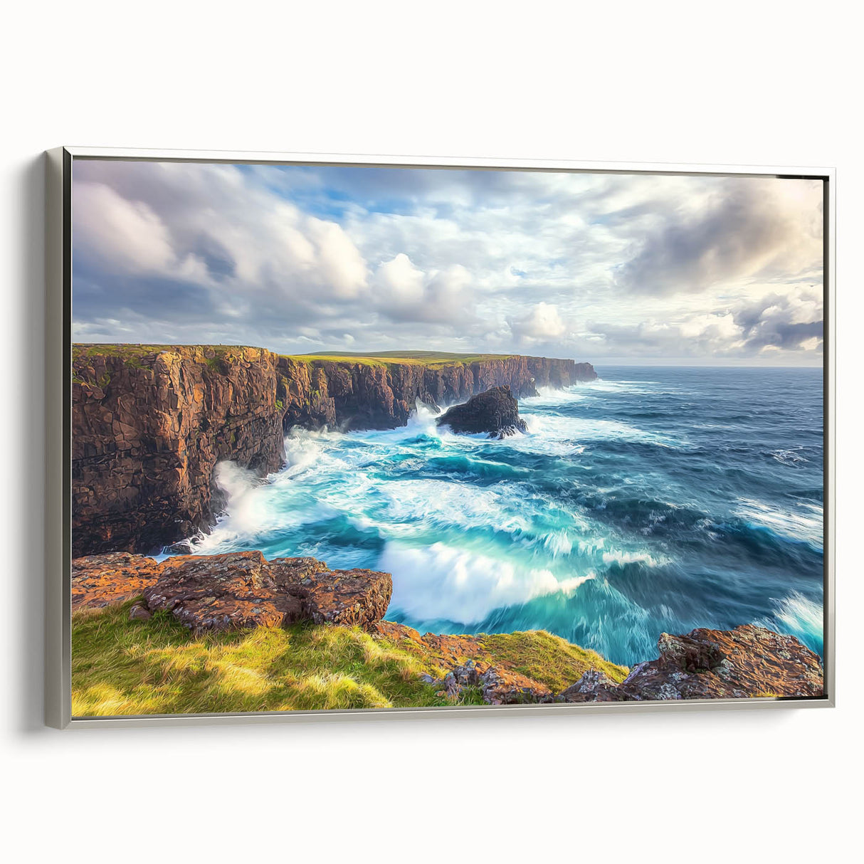 Framed canvas artwork depicting dramatic cliffs in a serene landscape, featuring a silver frame that enhances its elegance, perfect for home decor.