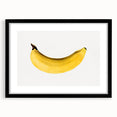 Extra large abstract art print featuring colorful textured fruits, in a black frame with mat, ideal for living room decor.