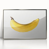 Mid-century modernist art featuring assorted fruits in vibrant colors on a silver-framed acrylic print.