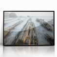 Framed acrylic artwork depicting a serene beach landscape with gentle waves and a clear blue sky, presented in a sleek black frame for elegant home decor.