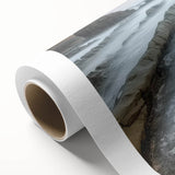 Rolled canvas artwork showcasing a serene beach landscape with vibrant colors and gentle waves, elegantly packaged in a protective cardboard tube for easy display.